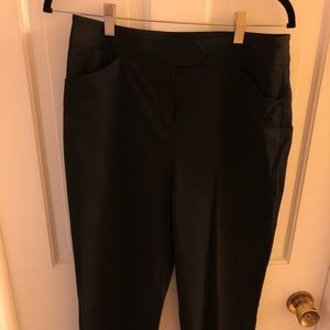 Women’s black dress pants.